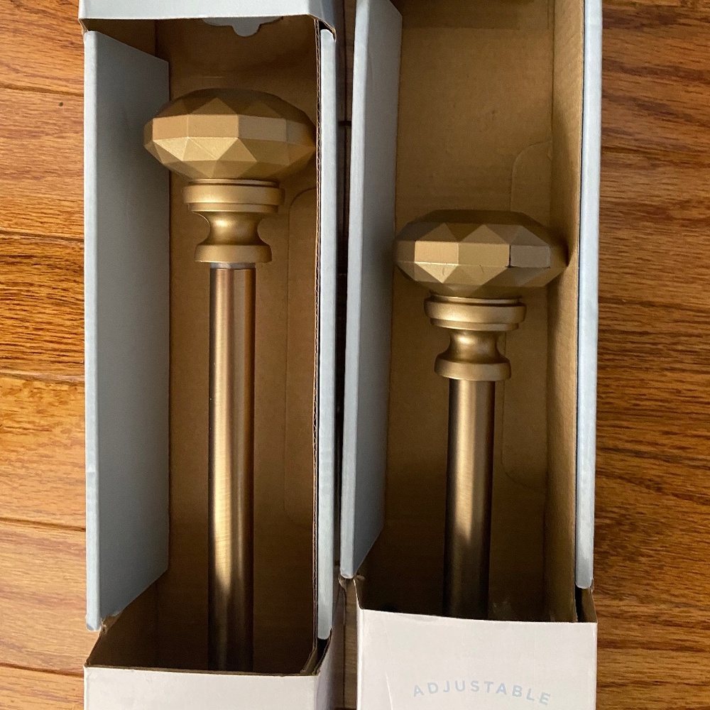 Two brand new 18-36 inch curtain rods